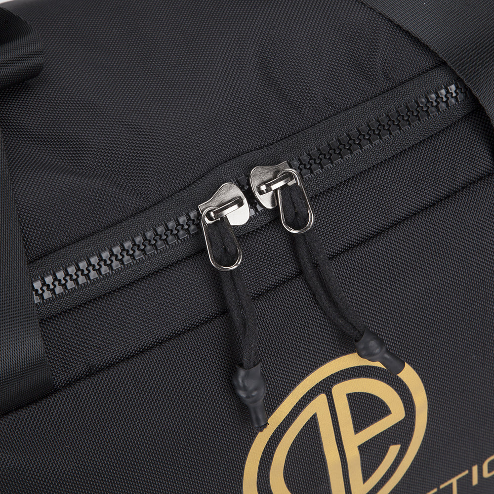 Black and gold top gym bag